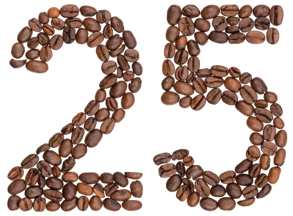 The number 25 formed by arranging brown coffee beans on a white background, perfect for sharing interesting coffee facts. Top Dose Roasters